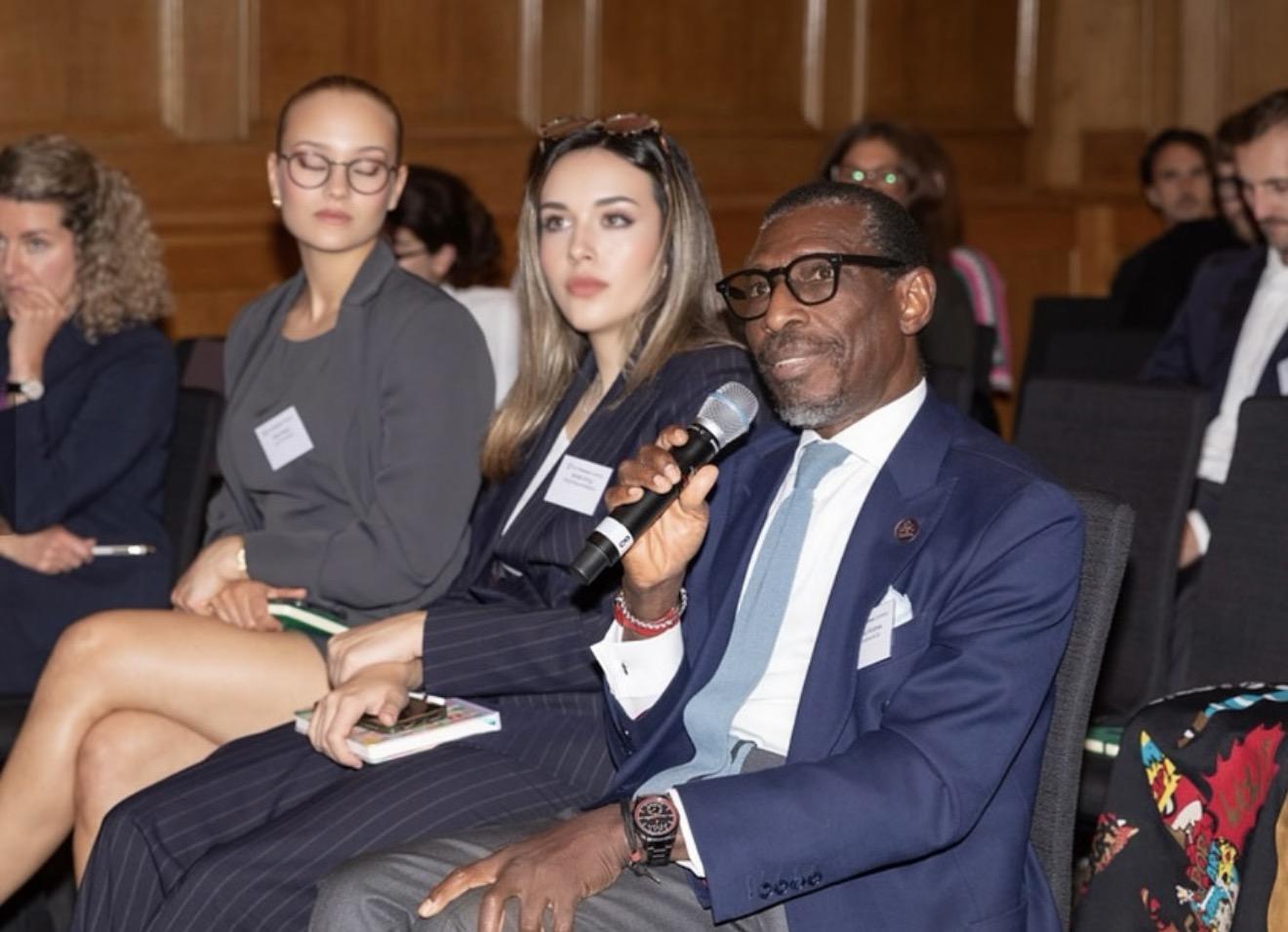 Audience member speaking into a microphone at The Art Business Conference London