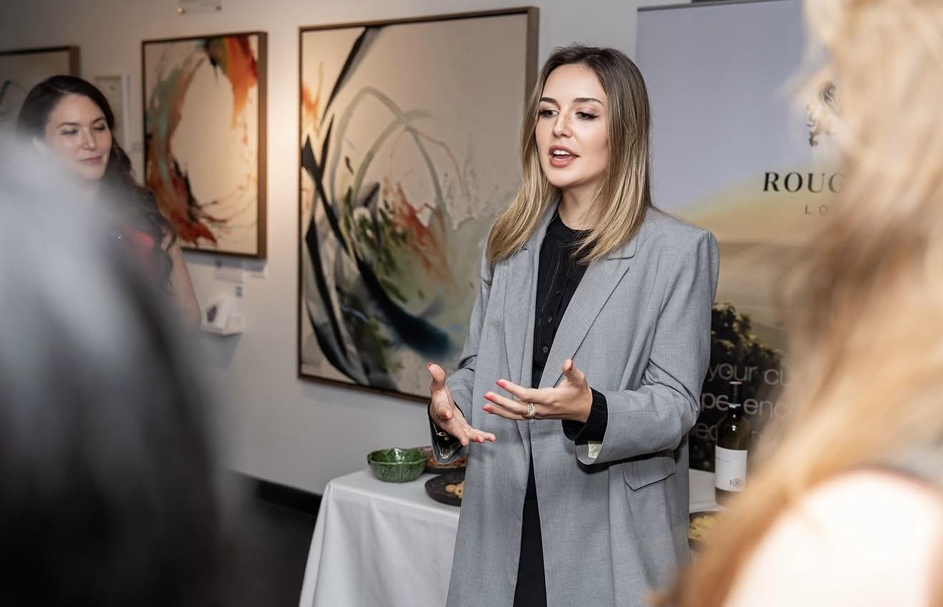 Alinda Kring speaking at a panel talk at The Audacity London