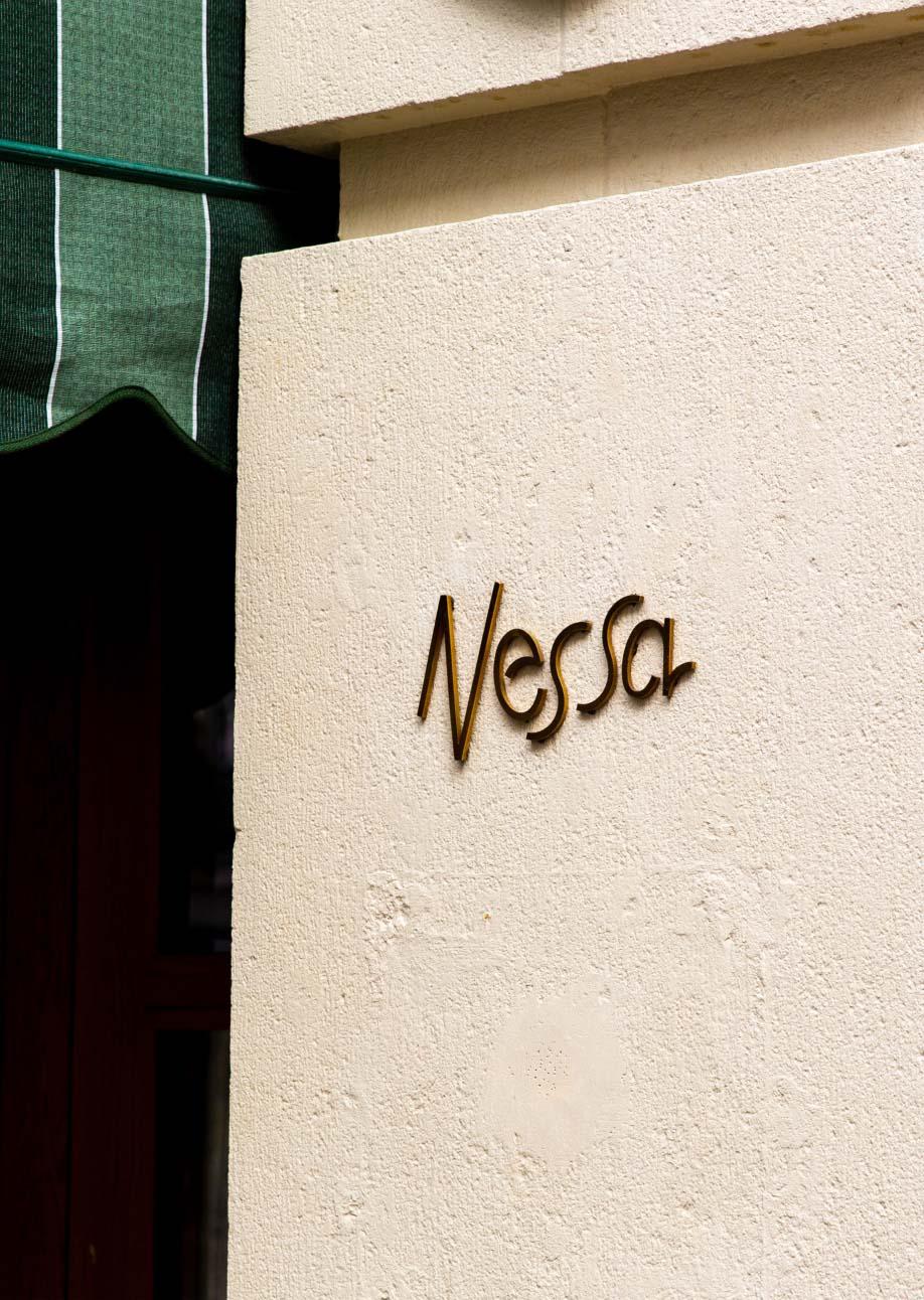 Nessa signage on a textured cream wall at Maslow’s 1 Warwick, Soho